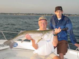 Mike Palmer and son with 38